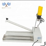SKA-600 EL SHRİNK MAKINASI.KUTULU ÜRÜNLERİ ISI İLE STREÇLEME MAKİNASİ